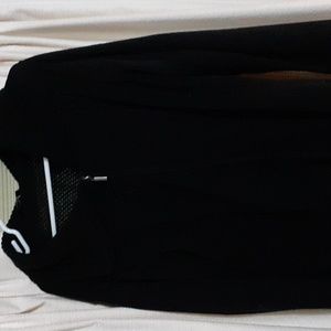This is a short waisted black zippered sweater  long sleeved